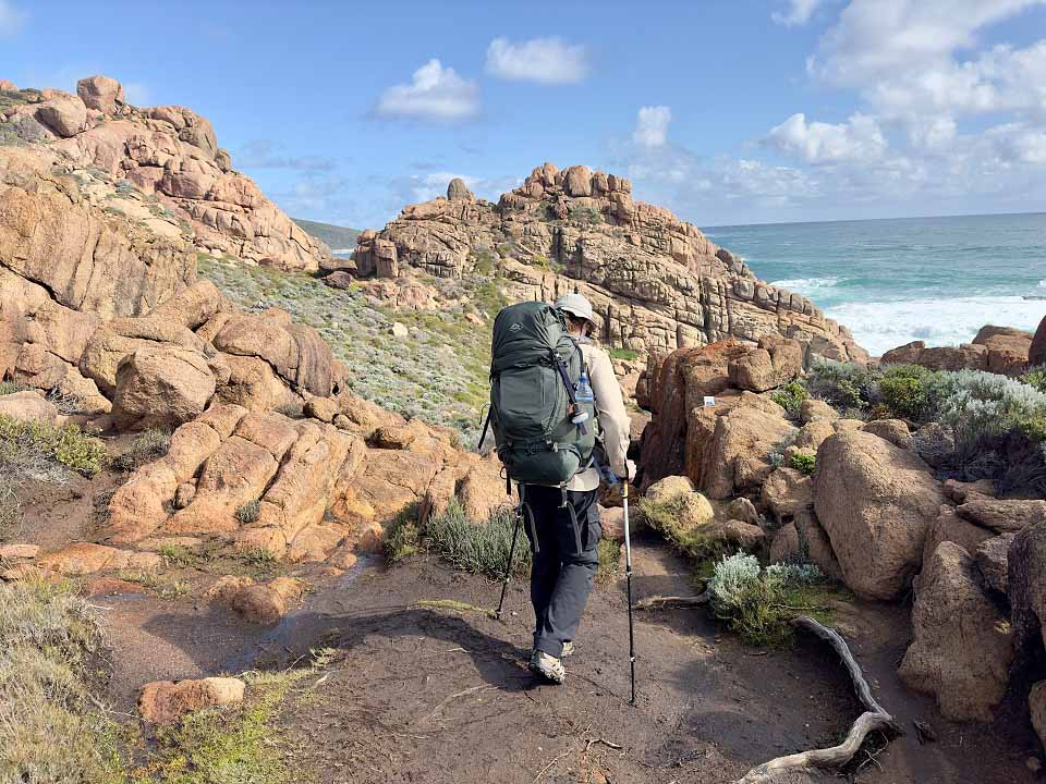 Tom Lucey using the X-Country 65L Hiking Pack & Tread trekking poles