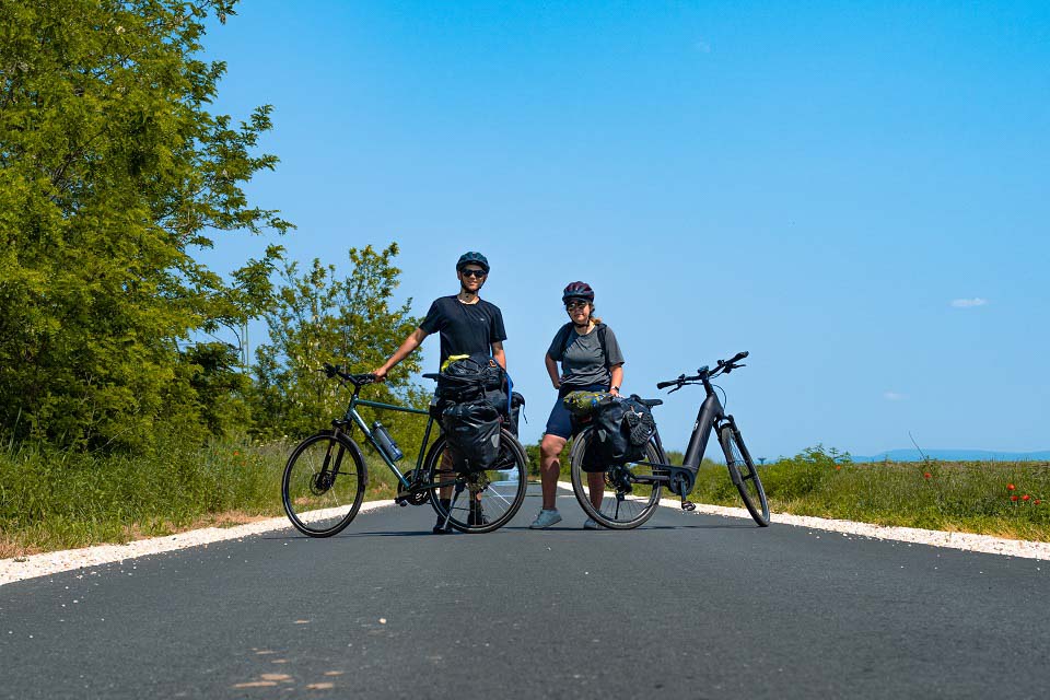Zach & Kaitlan posing on the road with their KTM Touring Bikes Zach & Kaitlan posing on the road with their KTM Touring Bikes
