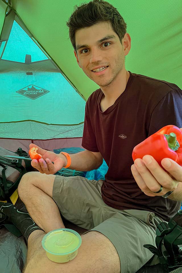 Zach having a dip snack break inside the Geo tent Zach having a dip snack break inside the Geo tent