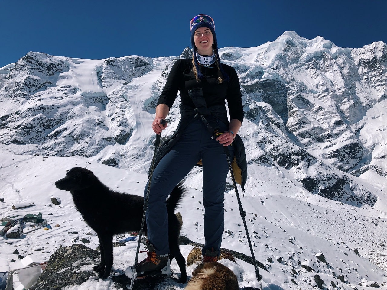 Claire Mackay & a local dog on the acclimatisation climb on the ridge next to Khare