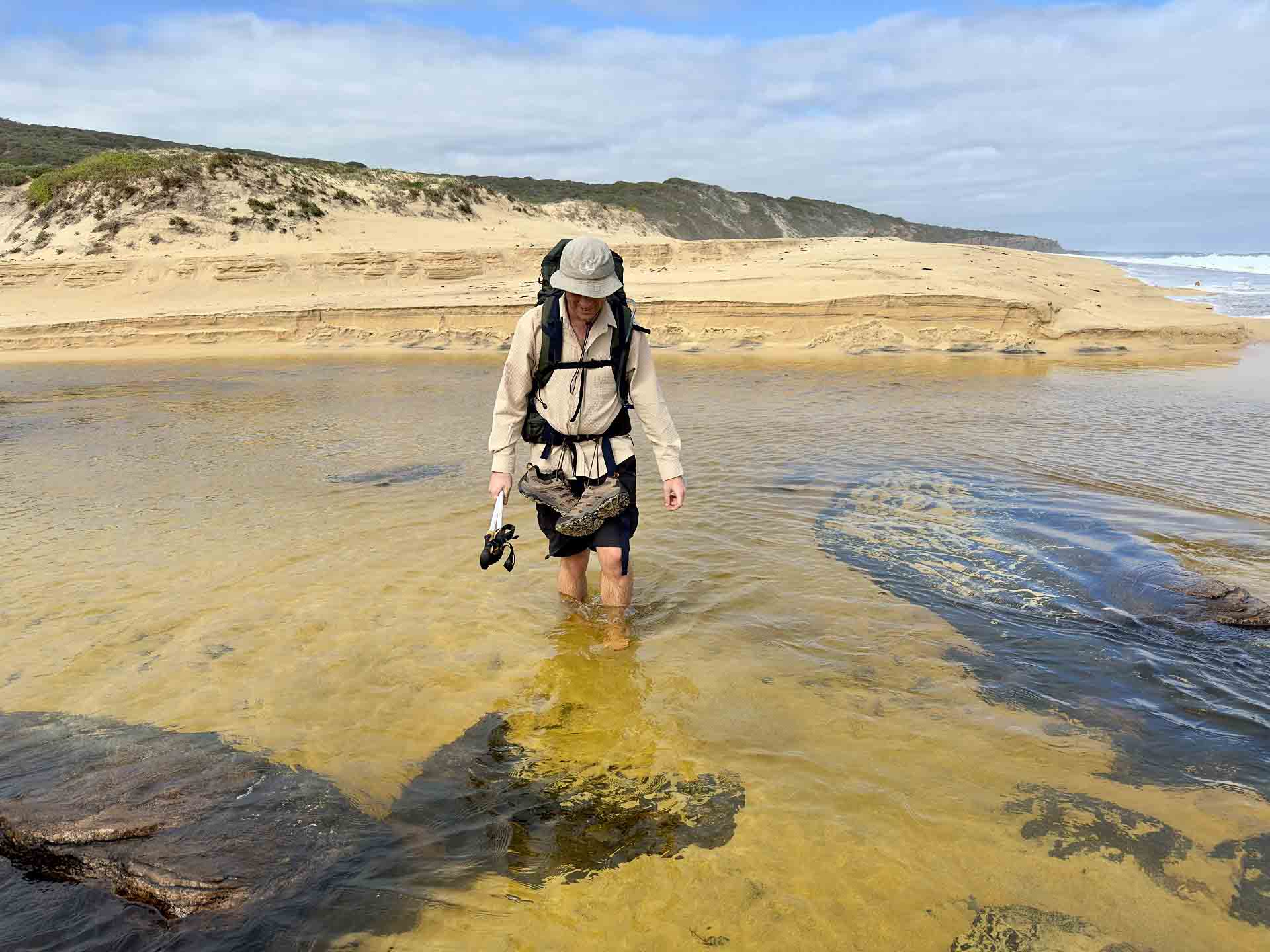 Tom Lucey wearing Larapinta convertibles through water