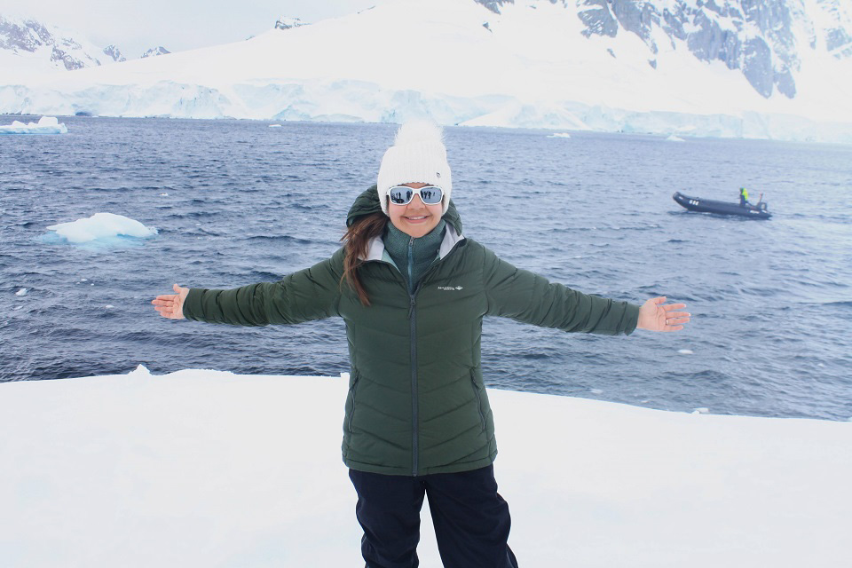 Ari Comben in the Women's Peak 700 Green Down Jacket Ari Comben in the Women's Peak 700 Green Down Jacket