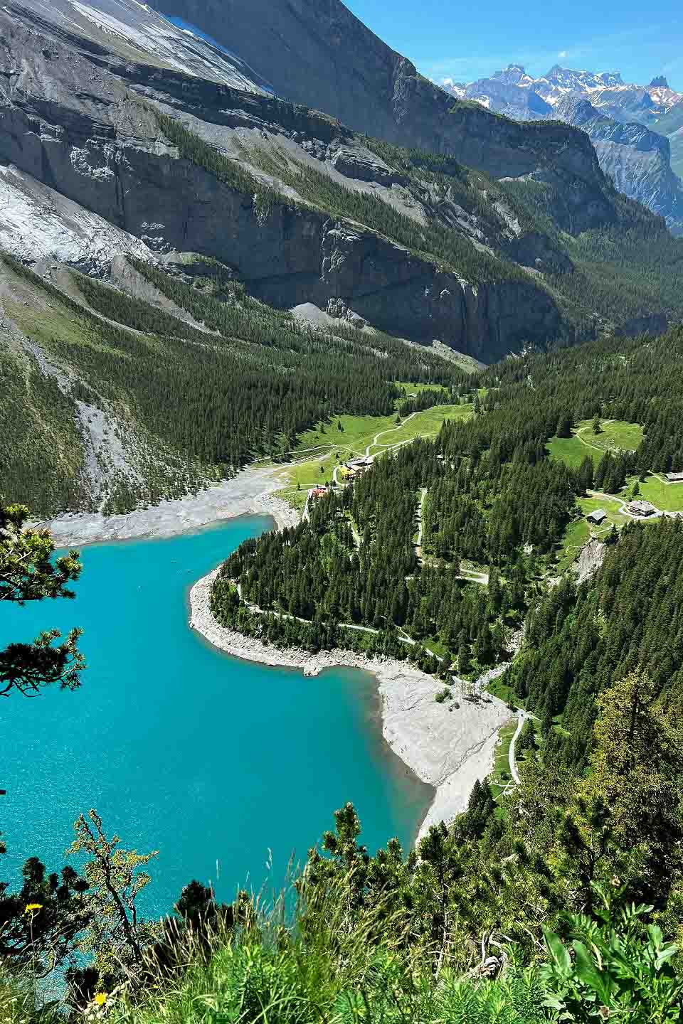 The incredible blue waters of Lake Oeschinen viewed from above The incredible blue waters of Lake Oeschinen viewed from above