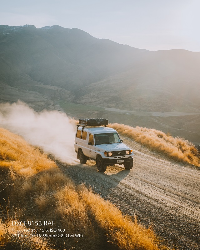 The Sunlight Lit Up The Dust Off The Road