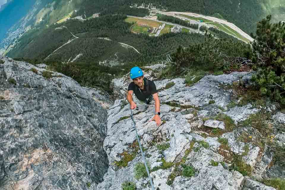 Wide fisheye shot of Zach Bostock cable climbing up the ascent Wide fisheye shot of Zach Bostock cable climbing up the ascent